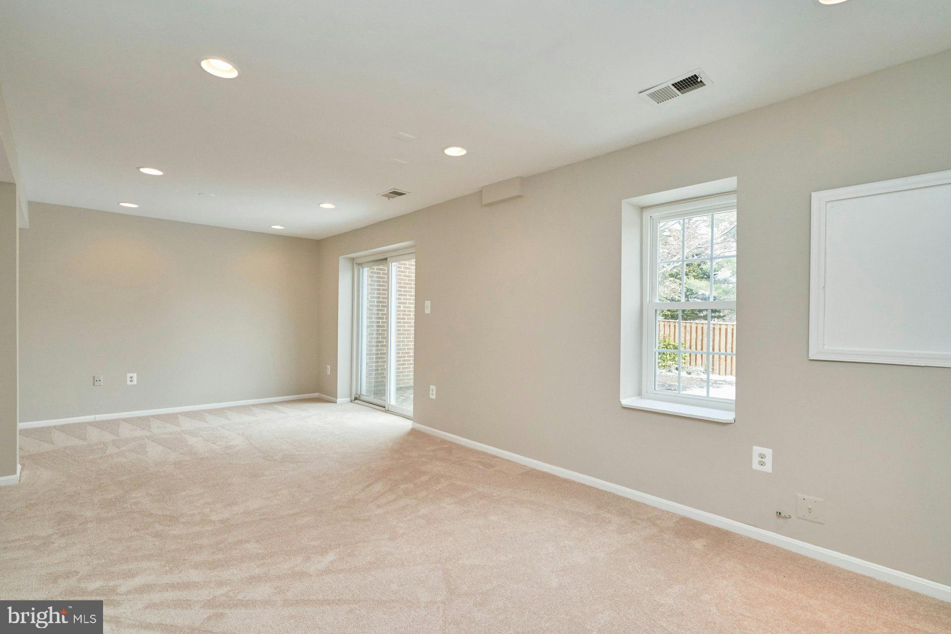9634 Blincoe Court Burke, VA 22015 - Photo 29 of 53 a view of an empty room with a window