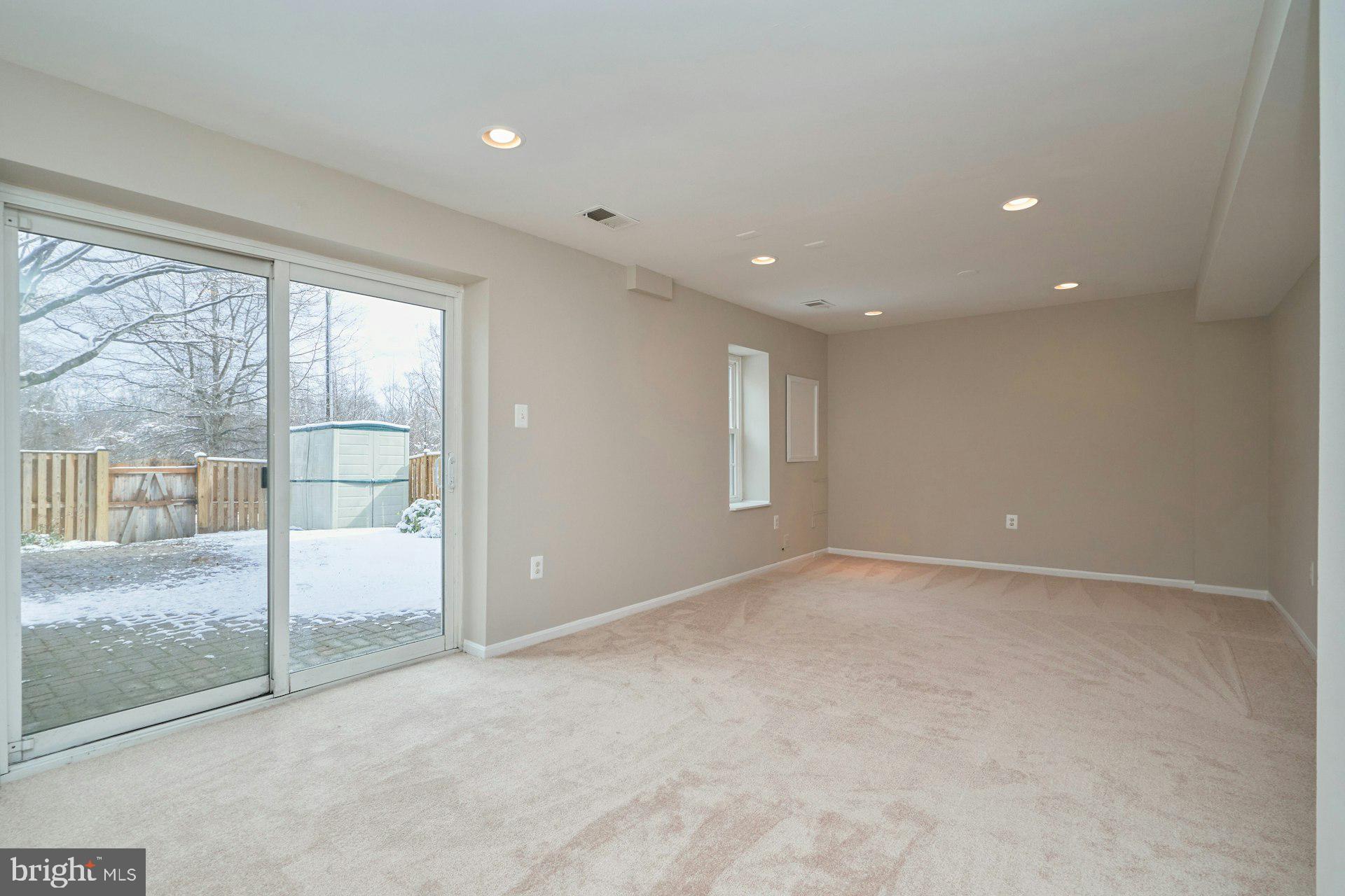 9634 Blincoe Court Burke, VA 22015 - Photo 32 of 53 a view of an empty room with a window