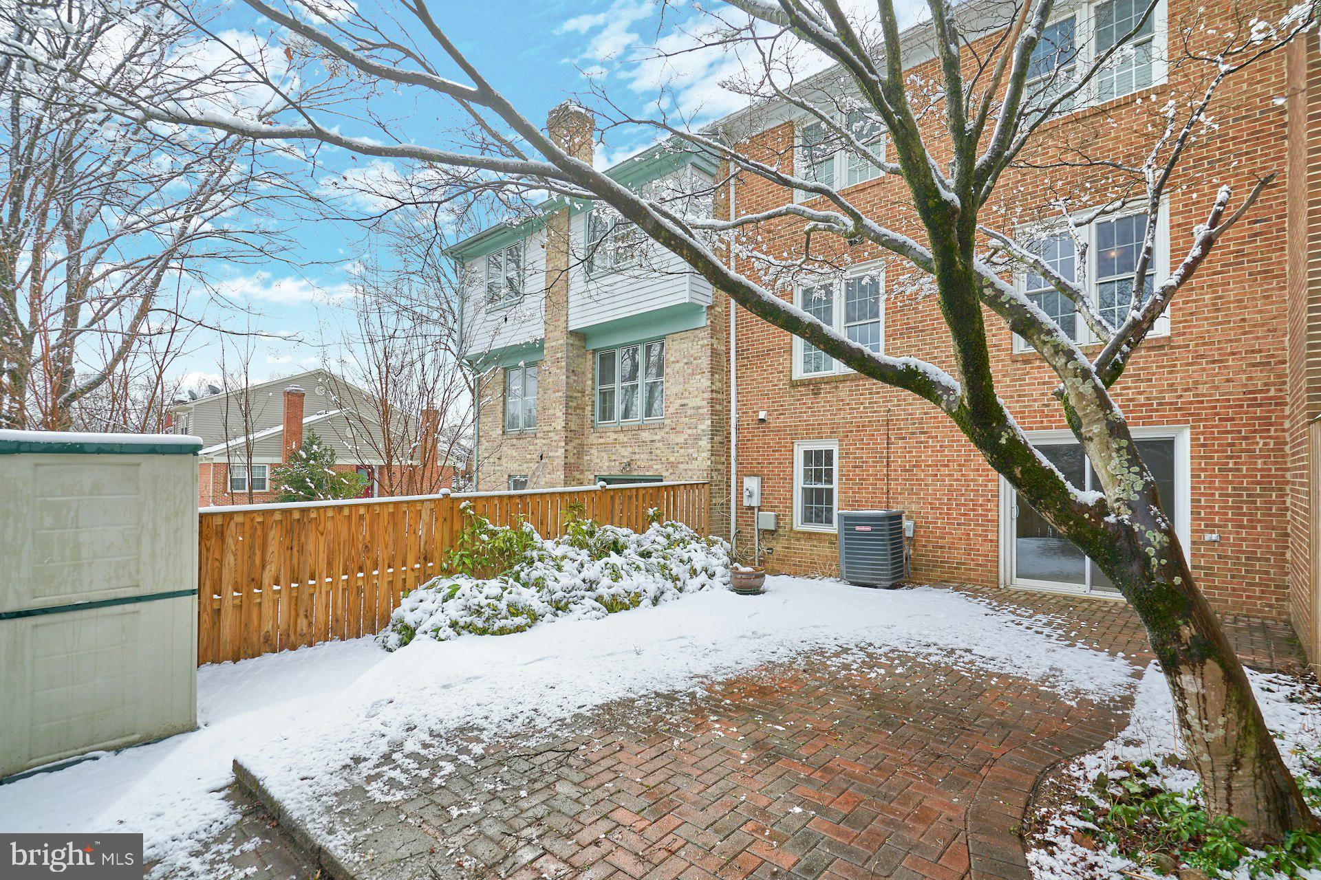9634 Blincoe Court Burke, VA 22015 - Photo 35 of 53 a view of a house with a snow in the background