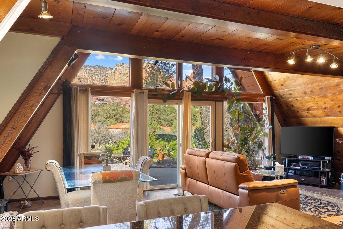189 Wilson Canyon Road Sedona, AZ 86336 - Photo 13 of 47 a living room with furniture and a large window