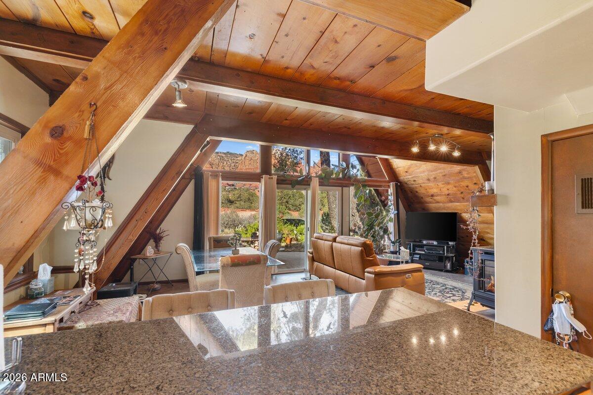 189 Wilson Canyon Road Sedona, AZ 86336 - Photo 14 of 47 a view of a living room with balcony and furniture