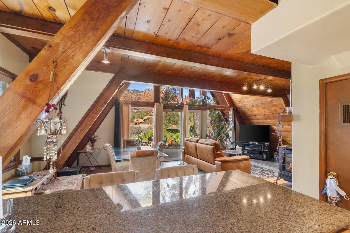 189 Wilson Canyon Road Sedona, AZ 86336 - Photo 16 of 47 a view of a living room with balcony and furniture