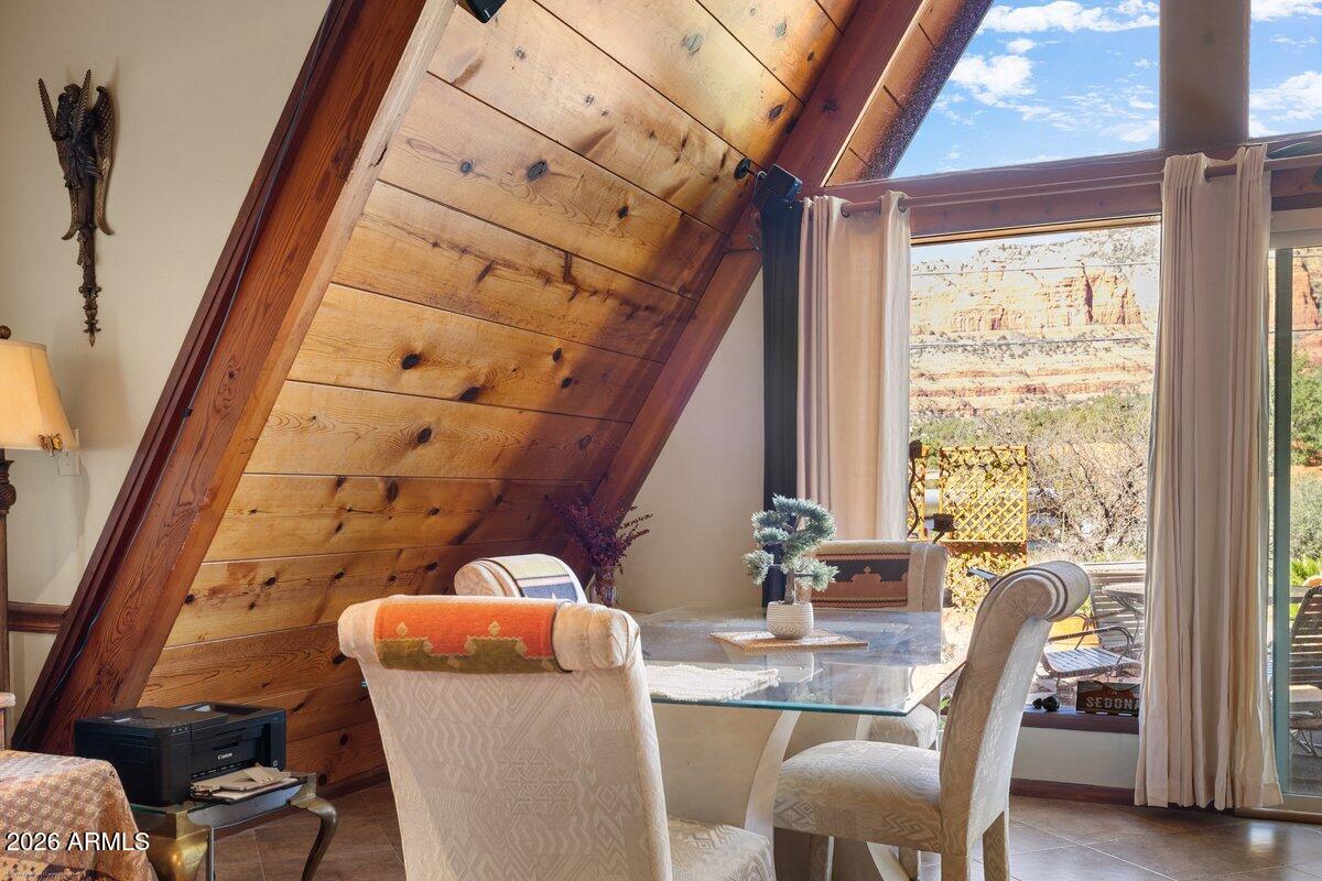 189 Wilson Canyon Road Sedona, AZ 86336 - Photo 18 of 47 a dining room with furniture and window