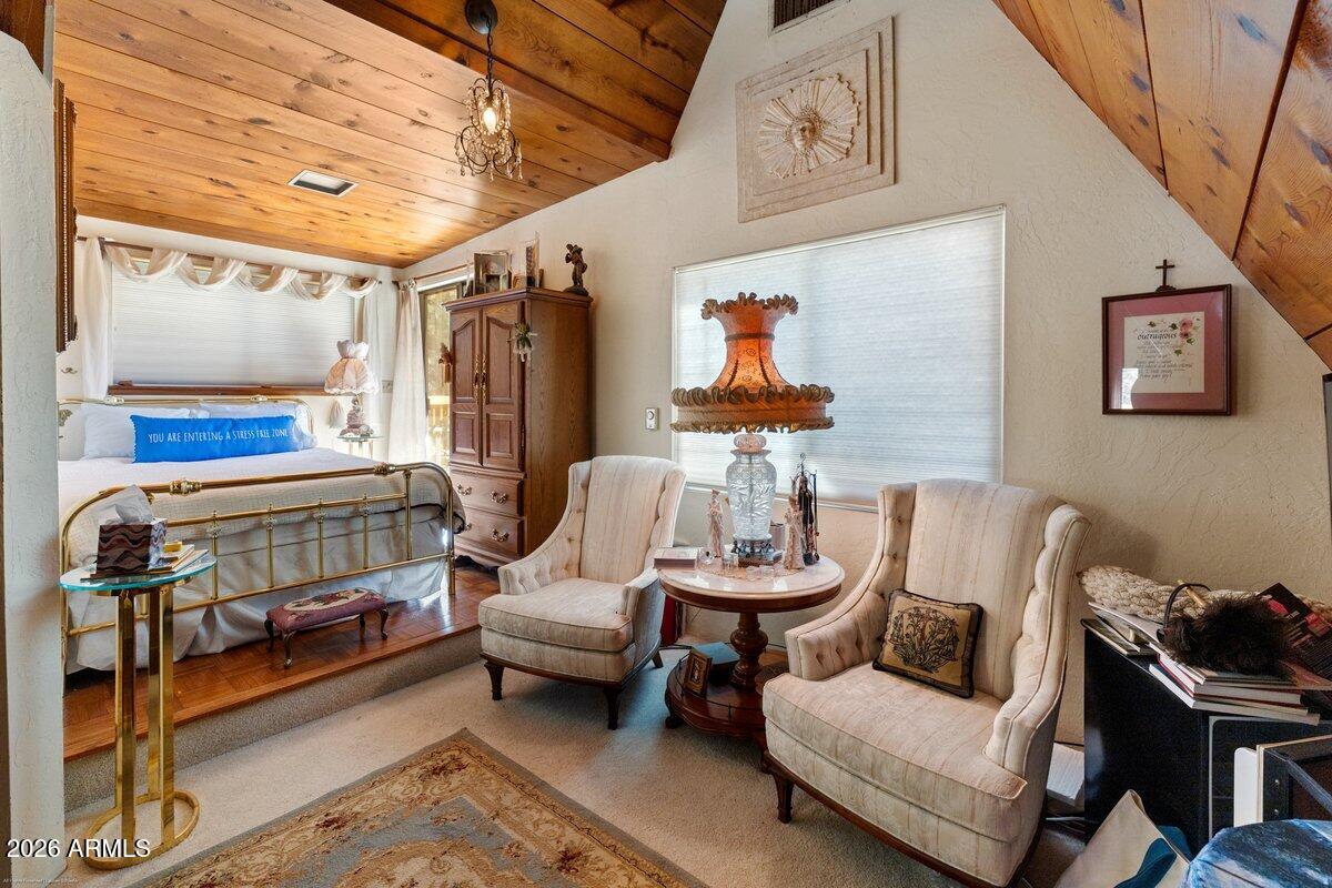 189 Wilson Canyon Road Sedona, AZ 86336 - Photo 24 of 47 a bedroom with furniture and a baby crib