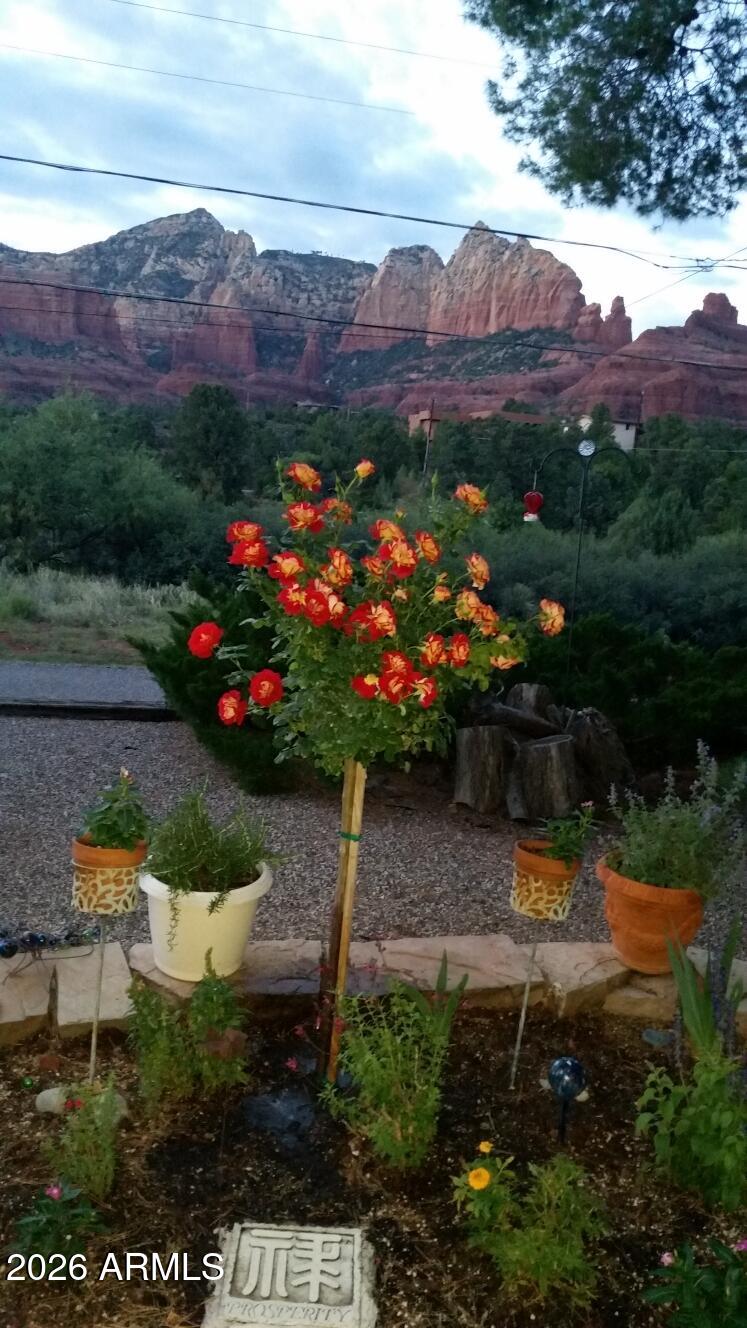 189 Wilson Canyon Road Sedona, AZ 86336 - Photo 47 of 47 a view of a city with a lake in the background