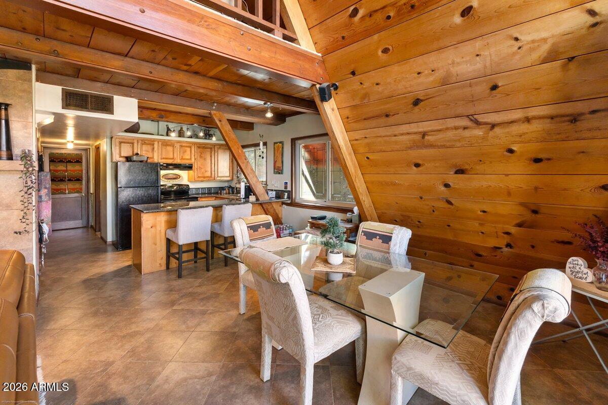 189 Wilson Canyon Road Sedona, AZ 86336 - Photo 8 of 47 a view of a patio with table and chairs