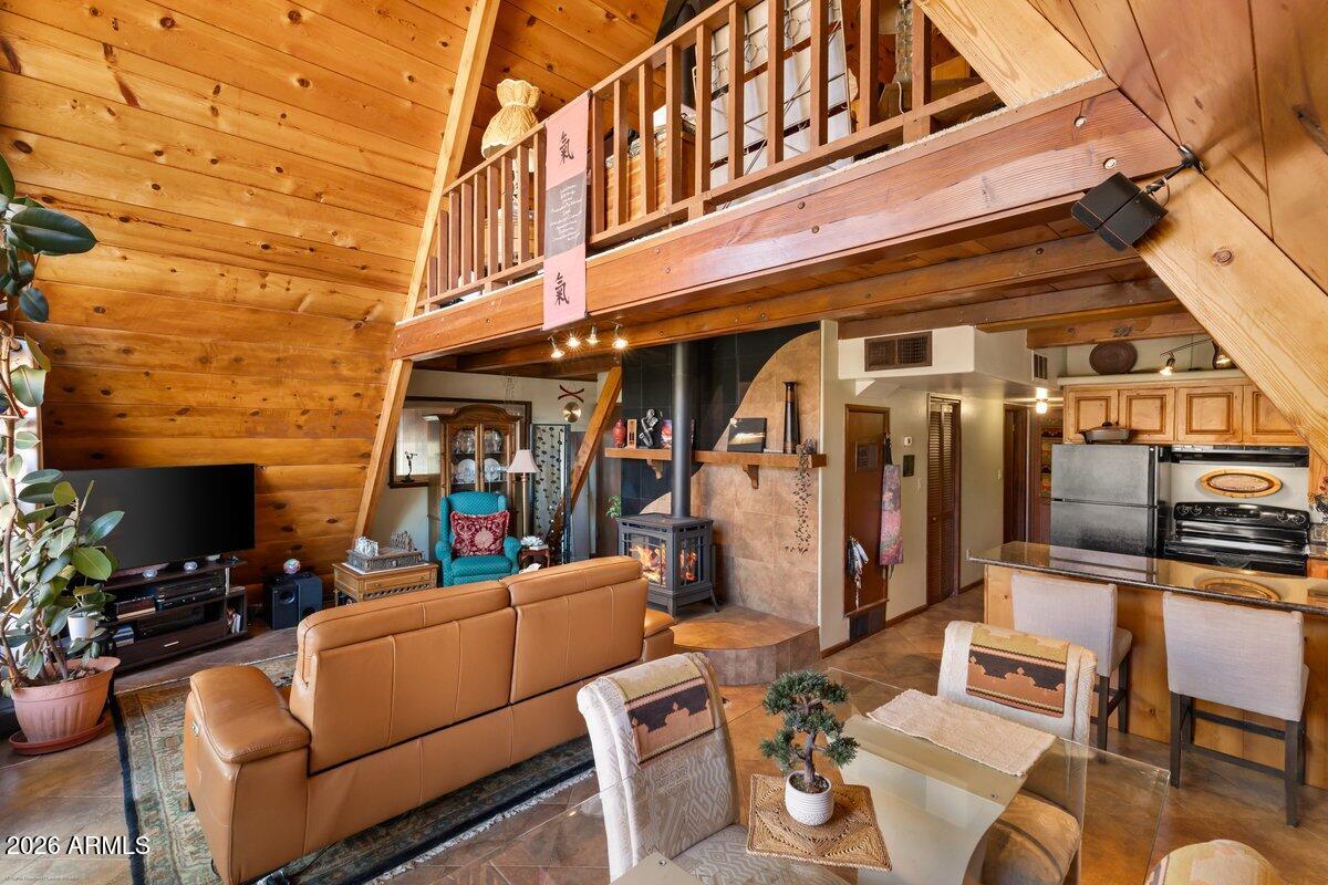 189 Wilson Canyon Road Sedona, AZ 86336 - Photo 9 of 47 a view of a chairs in a patio