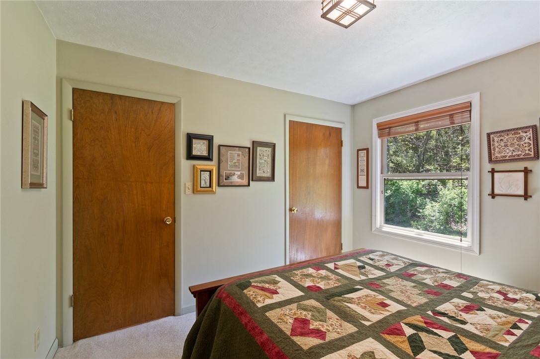 4397 Sebring Road Sodus, NY 14551 - Photo 24 of 43 The FIRST FLOOR BEDROOM- there’s an adjacent FULL