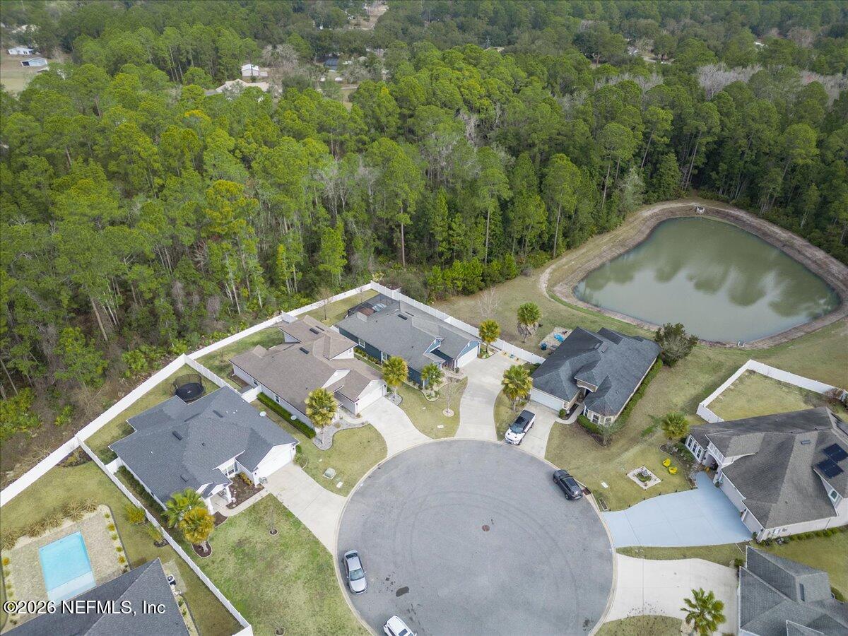 96085 Breezeway Court Yulee, FL 32097 - Photo 55 of 59 an aerial view of a house with pool