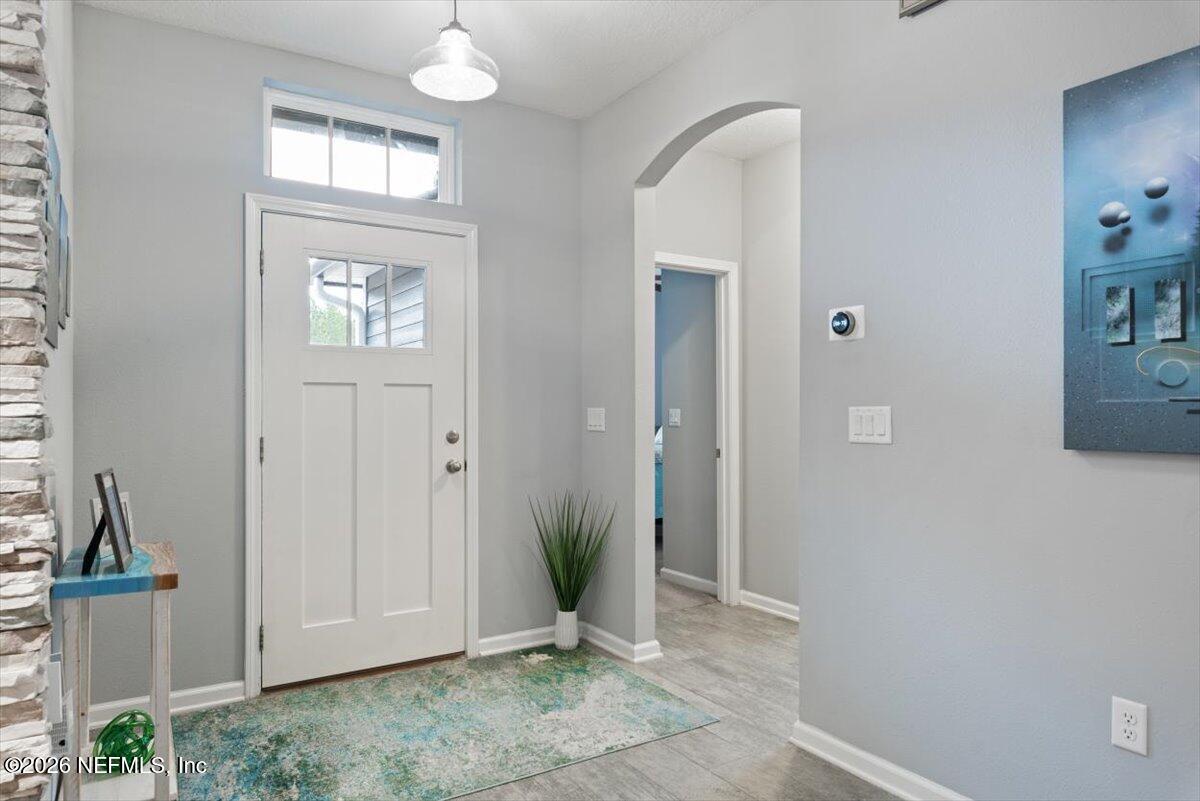 96085 Breezeway Court Yulee, FL 32097 - Photo 10 of 59 a view of entryway with livingroom