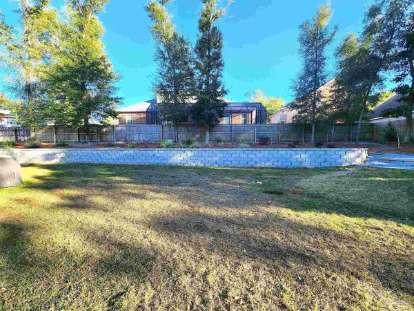a view of swimming pool is middle in the garden