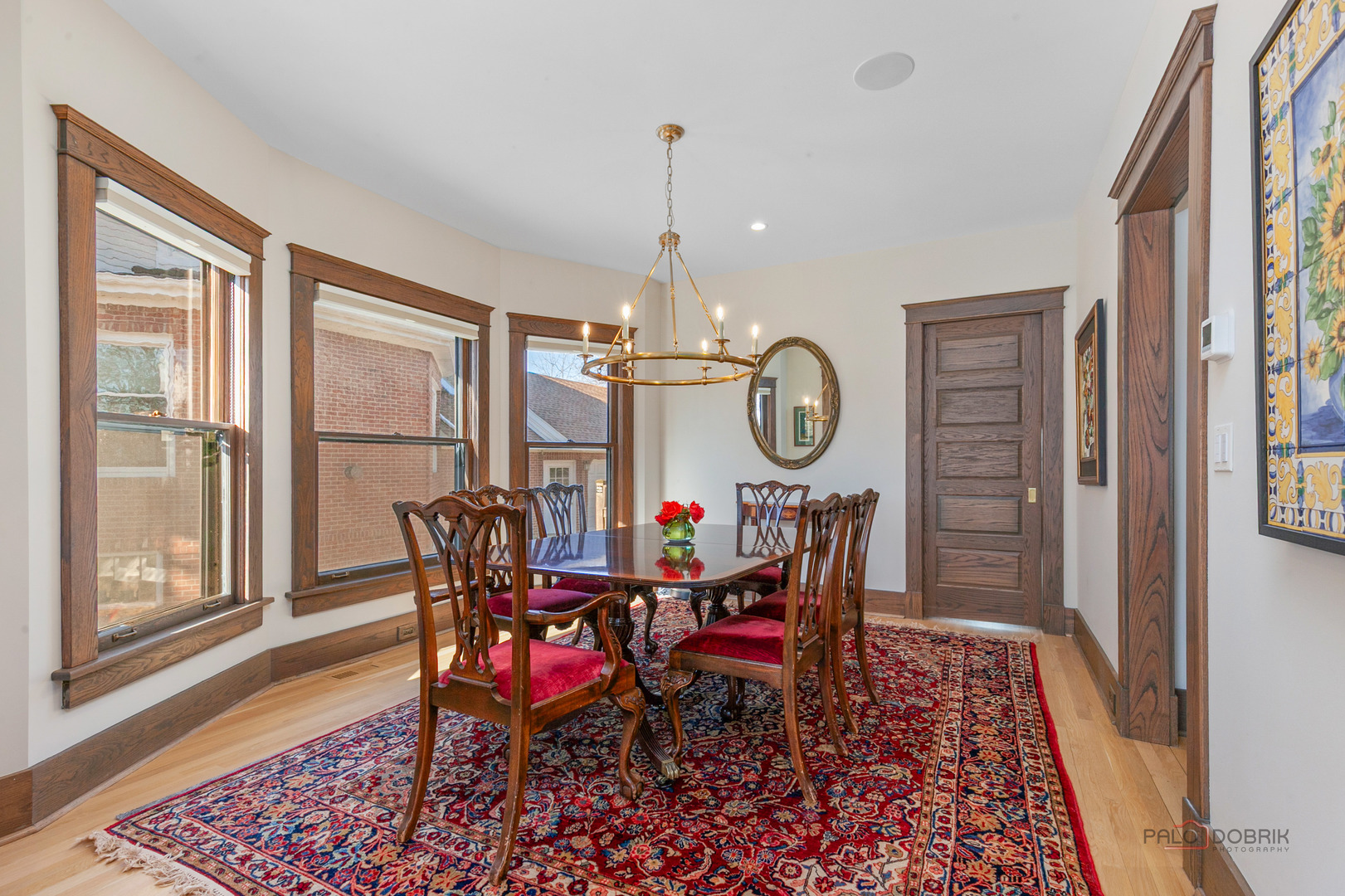 90 East Woodland Road Lake Forest, IL 60045 - Photo 11 of 40 a view of a dining room with furniture window and wooden floor