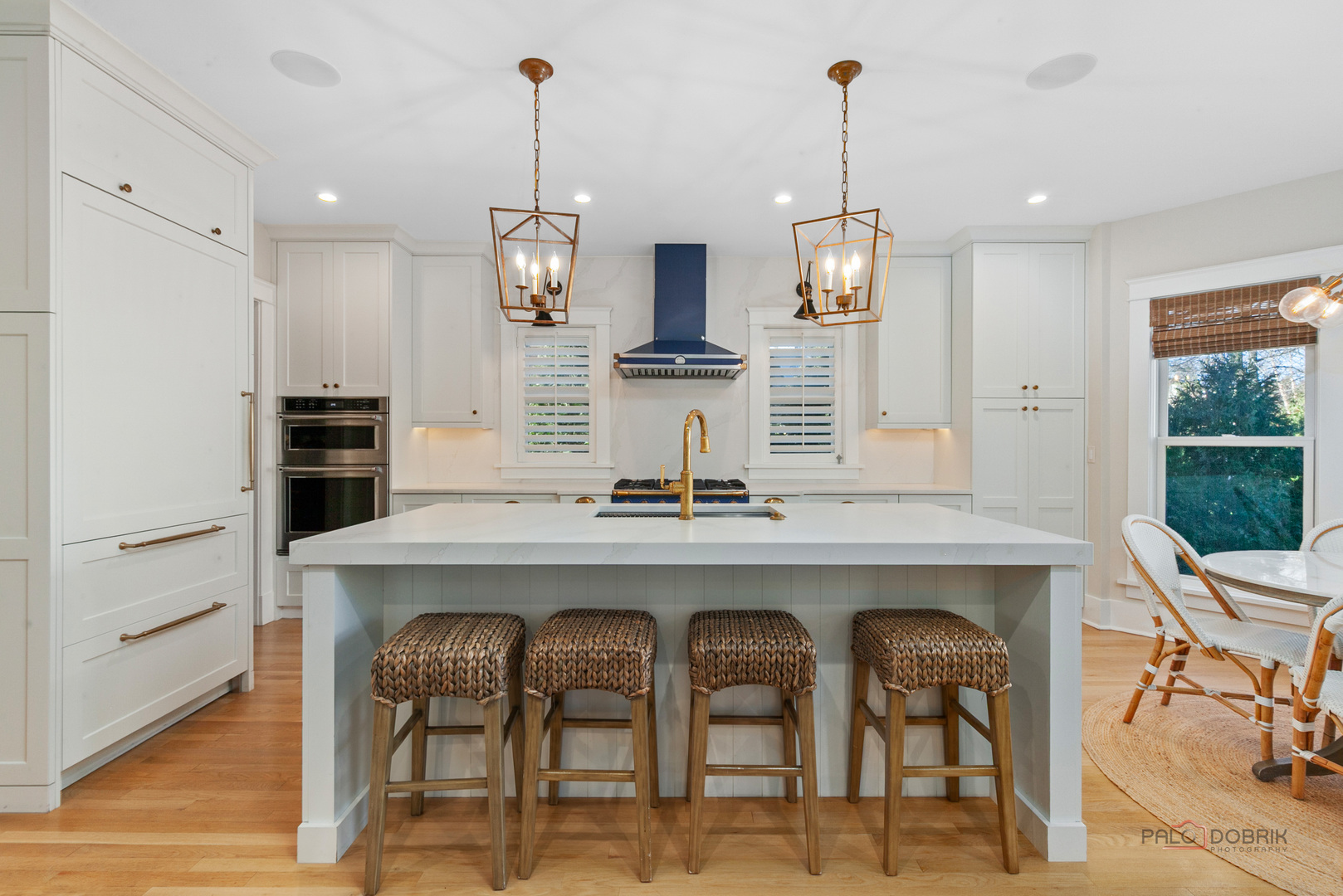90 East Woodland Road Lake Forest, IL 60045 - Photo 13 of 40 a kitchen with cabinets and chairs
