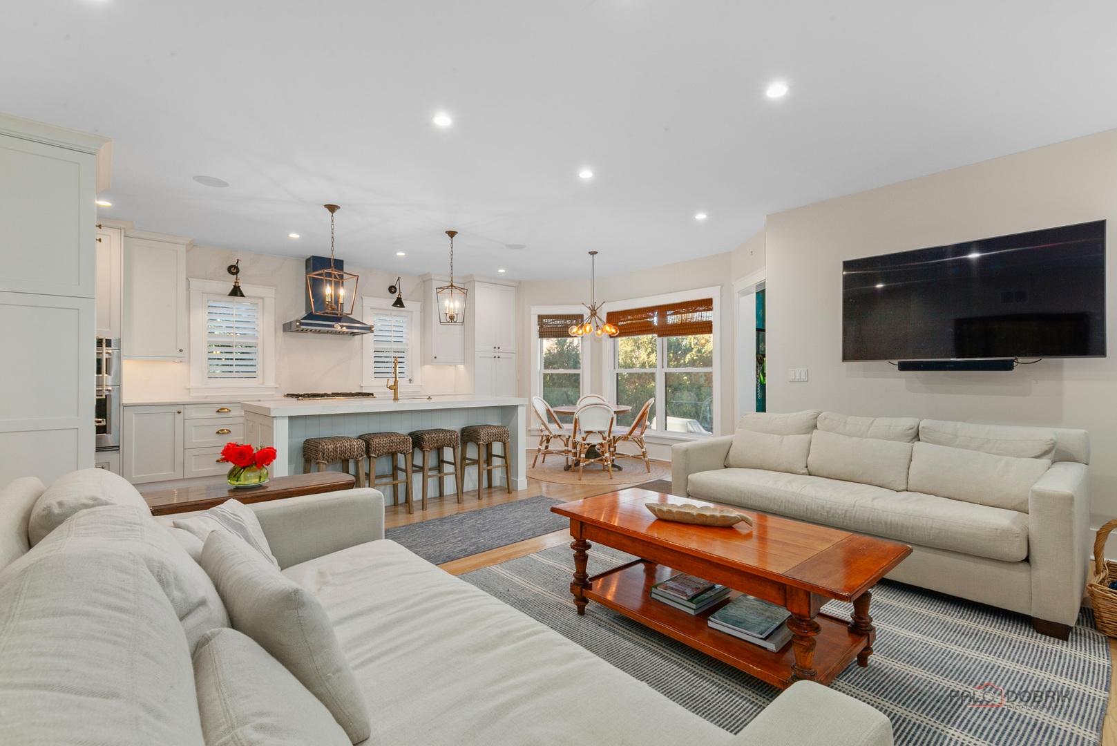 90 East Woodland Road Lake Forest, IL 60045 - Photo 17 of 40 a living room with furniture and a flat screen tv