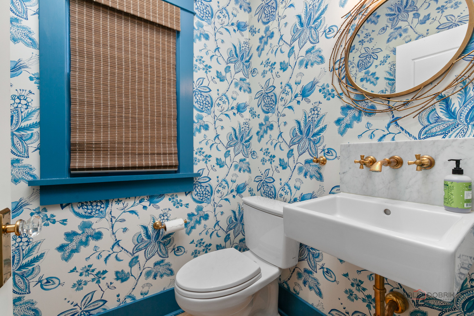 90 East Woodland Road Lake Forest, IL 60045 - Photo 19 of 40 a bathroom with a sink and a toilet