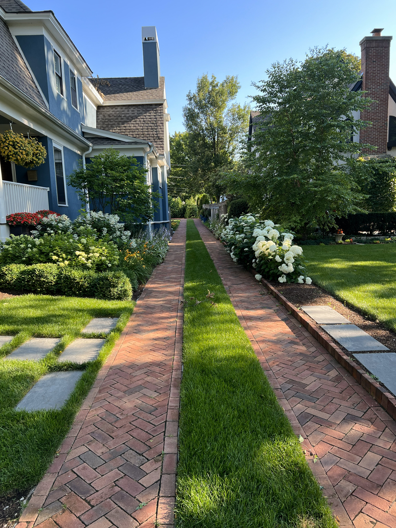 90 East Woodland Road Lake Forest, IL 60045 - Photo 2 of 40 a view of a house with a yard