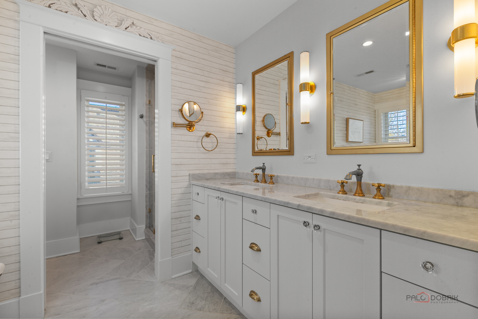 90 East Woodland Road Lake Forest, IL 60045 - Photo 28 of 40 a bathroom with double sink and a mirror