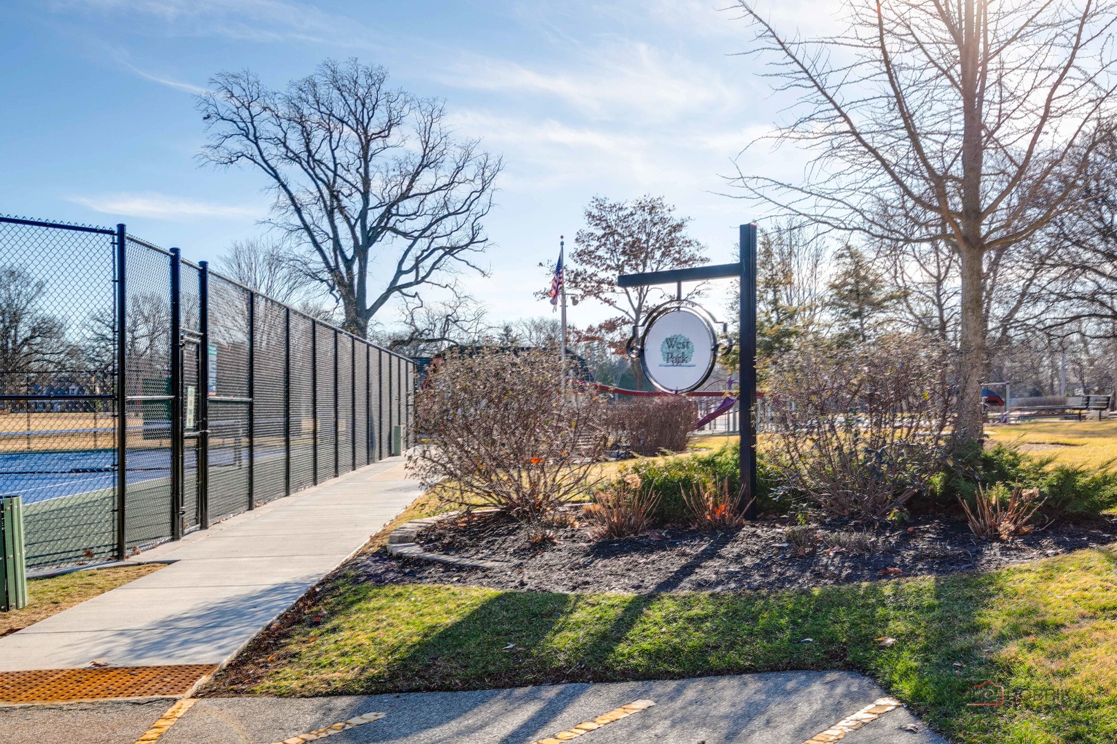 90 East Woodland Road Lake Forest, IL 60045 - Photo 36 of 40 a view of a park with iron fence