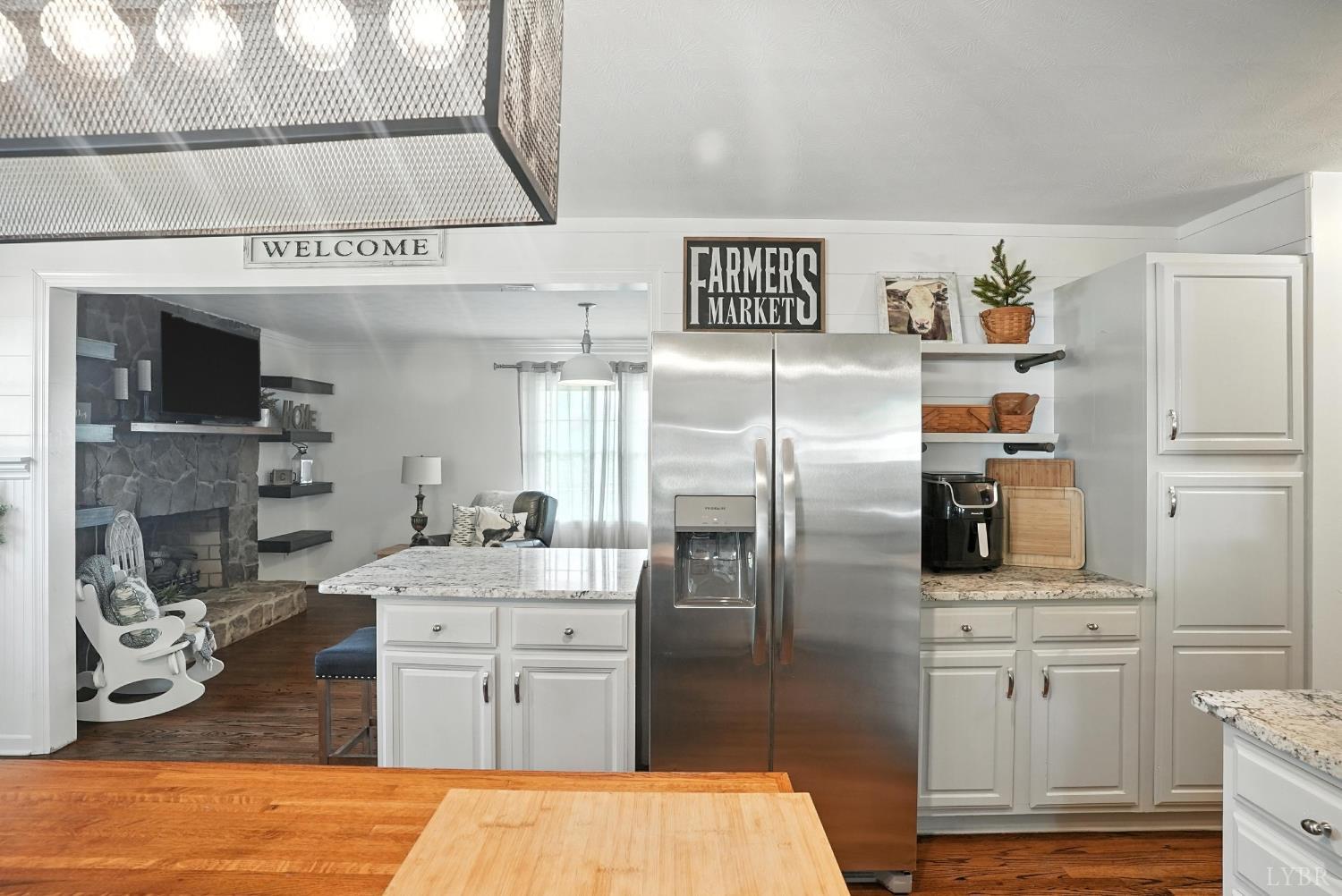 1348 Salem Road Spout Spring, VA 24593 - Photo 22 of 89 a kitchen with stainless steel appliances granite countertop a refrigerator and a stove