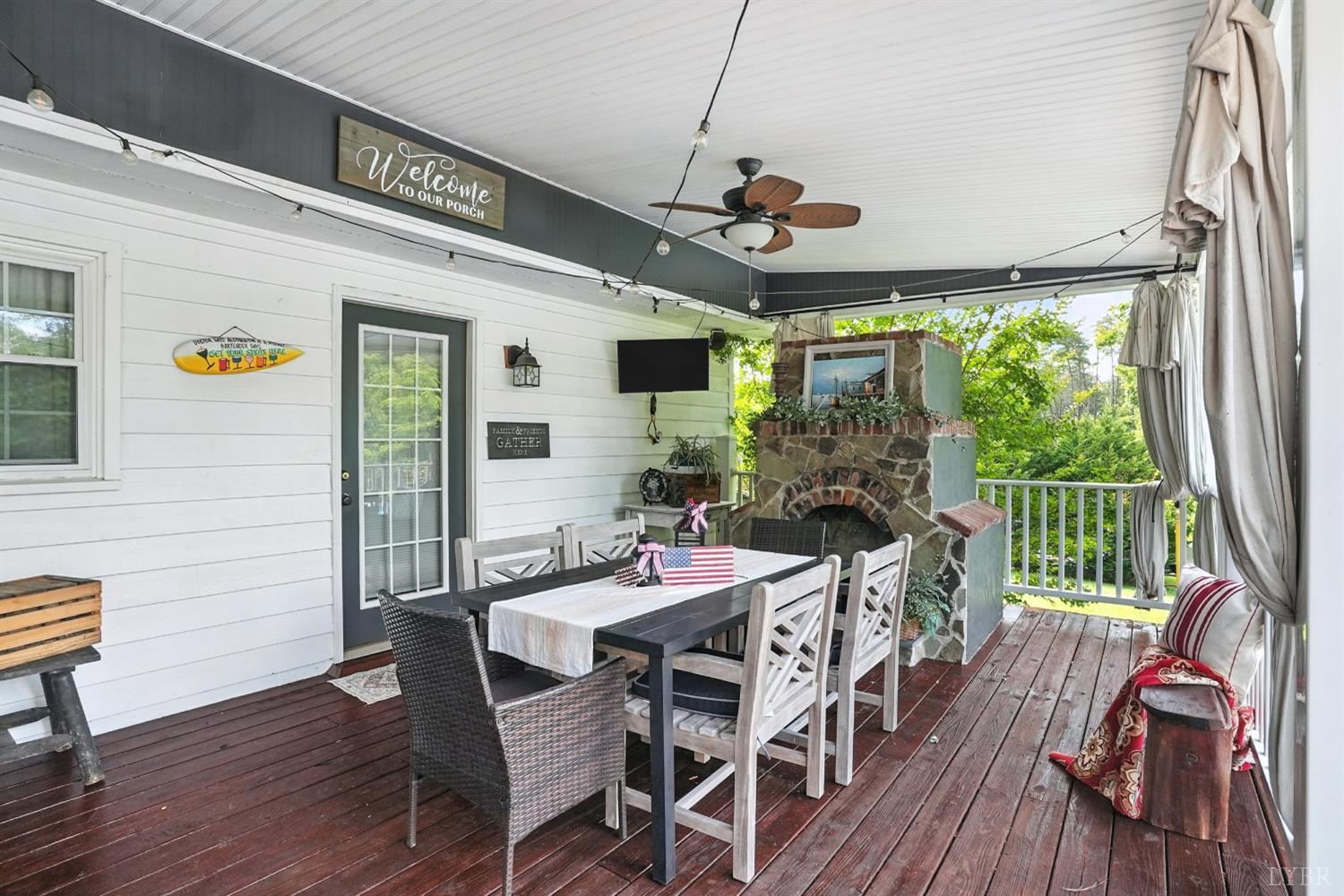 1348 Salem Road Spout Spring, VA 24593 - Photo 41 of 89 a view of a dining room with furniture window and wooden floor
