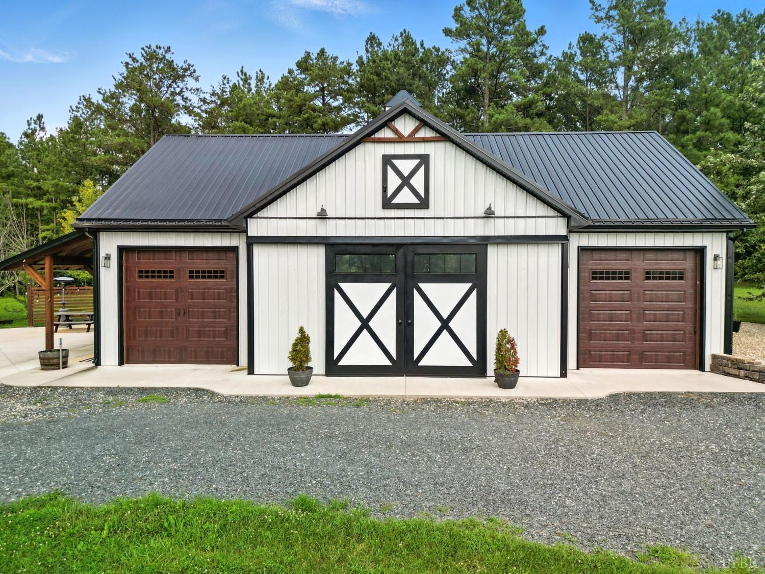 1348 Salem Road Spout Spring, VA 24593 - Photo 45 of 89 a front view of a house with garden