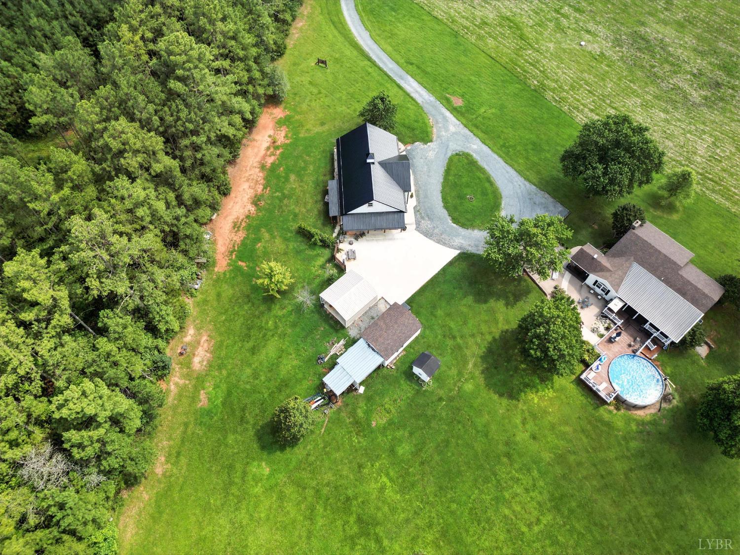 1348 Salem Road Spout Spring, VA 24593 - Photo 66 of 89 an aerial view of a house with a yard and outdoor seating