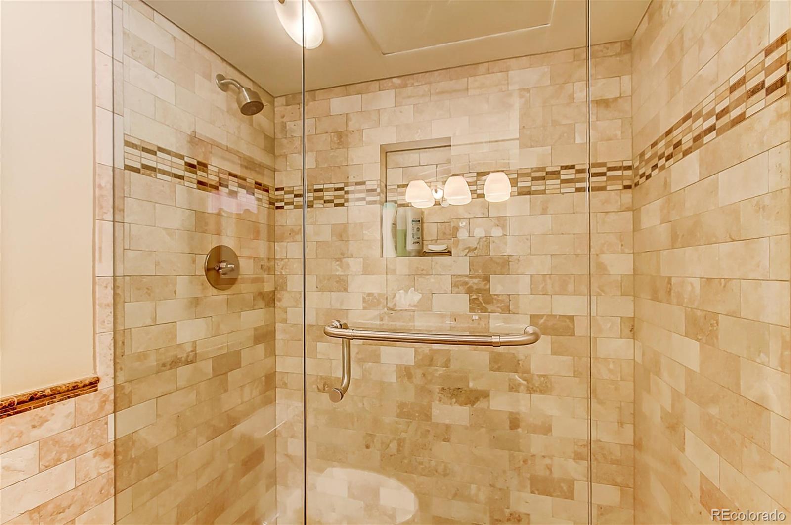 1020 15th Street, Unit 25J Denver, CO 80202 - Photo 20 of 34 a bathroom with a shower