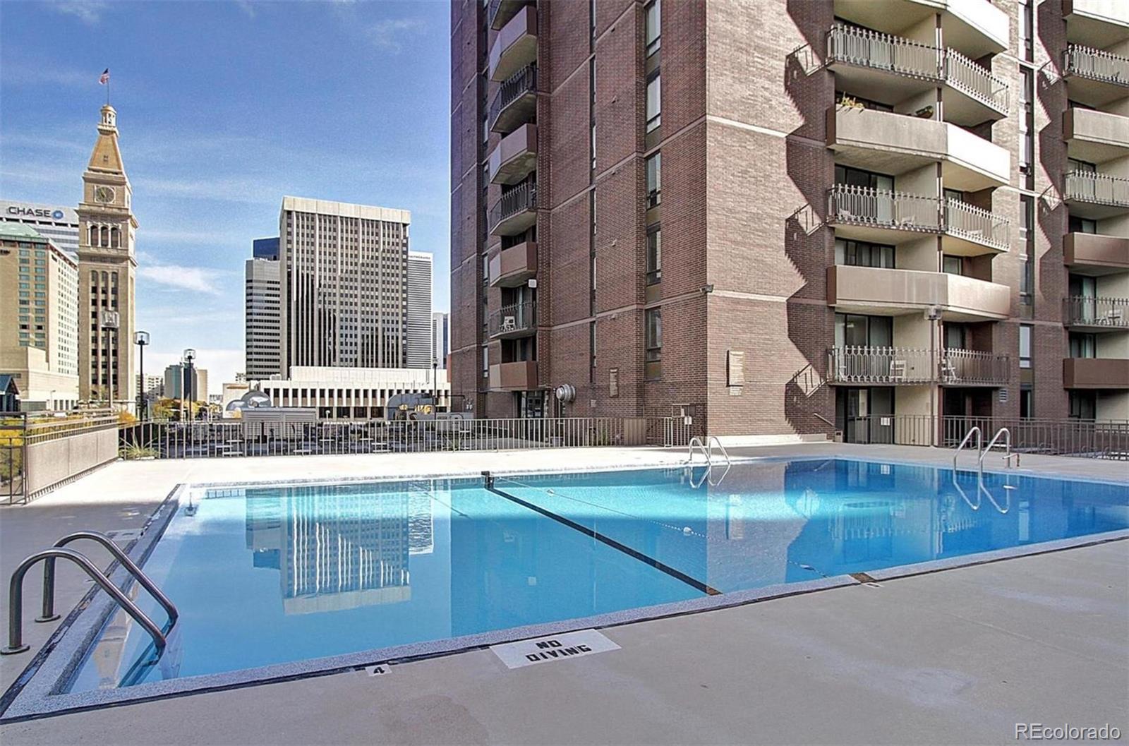 1020 15th Street, Unit 25J Denver, CO 80202 - Photo 31 of 34 a view of a building with a swimming pool