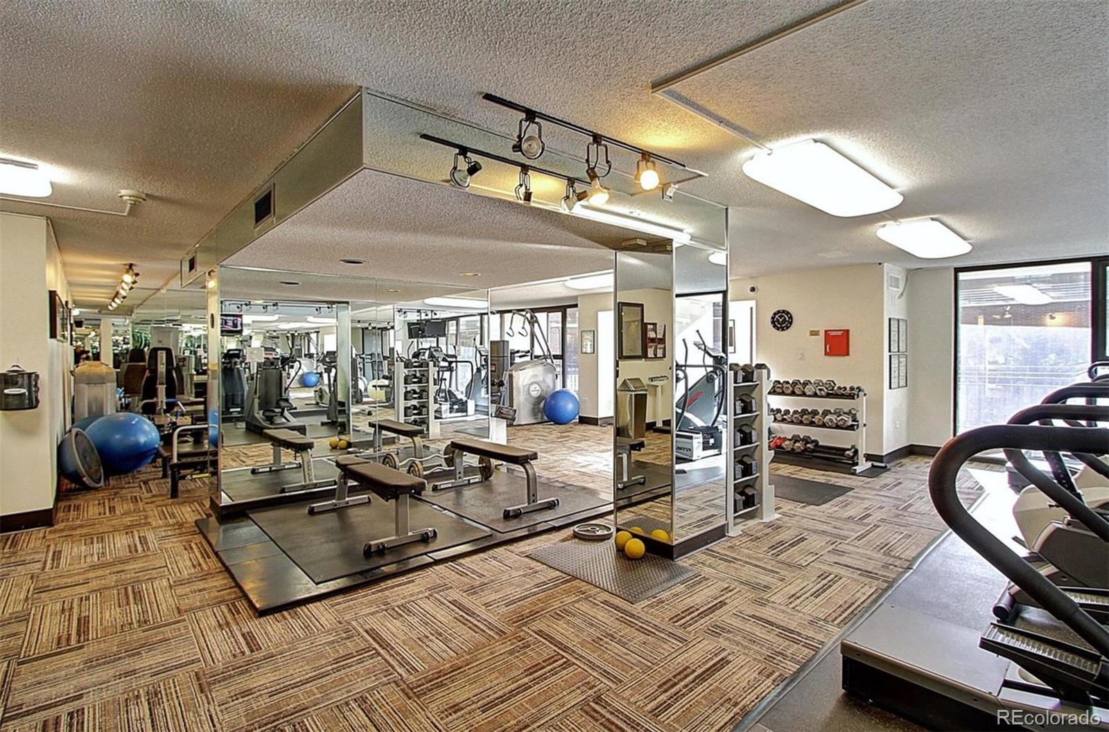 1020 15th Street, Unit 25J Denver, CO 80202 - Photo 32 of 34 a view of a room with gym equipment