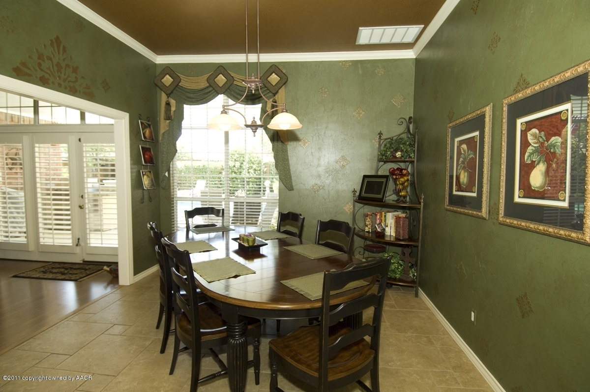 7821 Covington Parkway Amarillo, TX 79121 - Photo 13 of 53 a view of a dining room with furniture and a large window