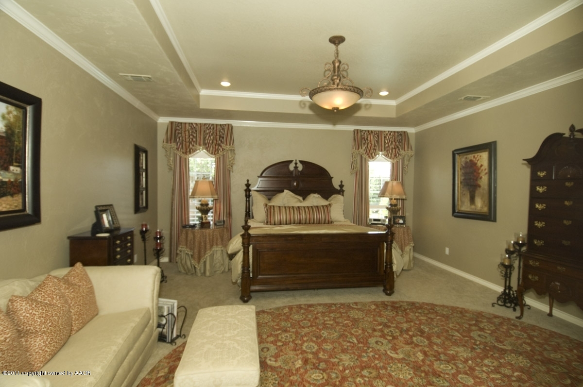 7821 Covington Parkway Amarillo, TX 79121 - Photo 39 of 53 a living room with furniture and a chandelier