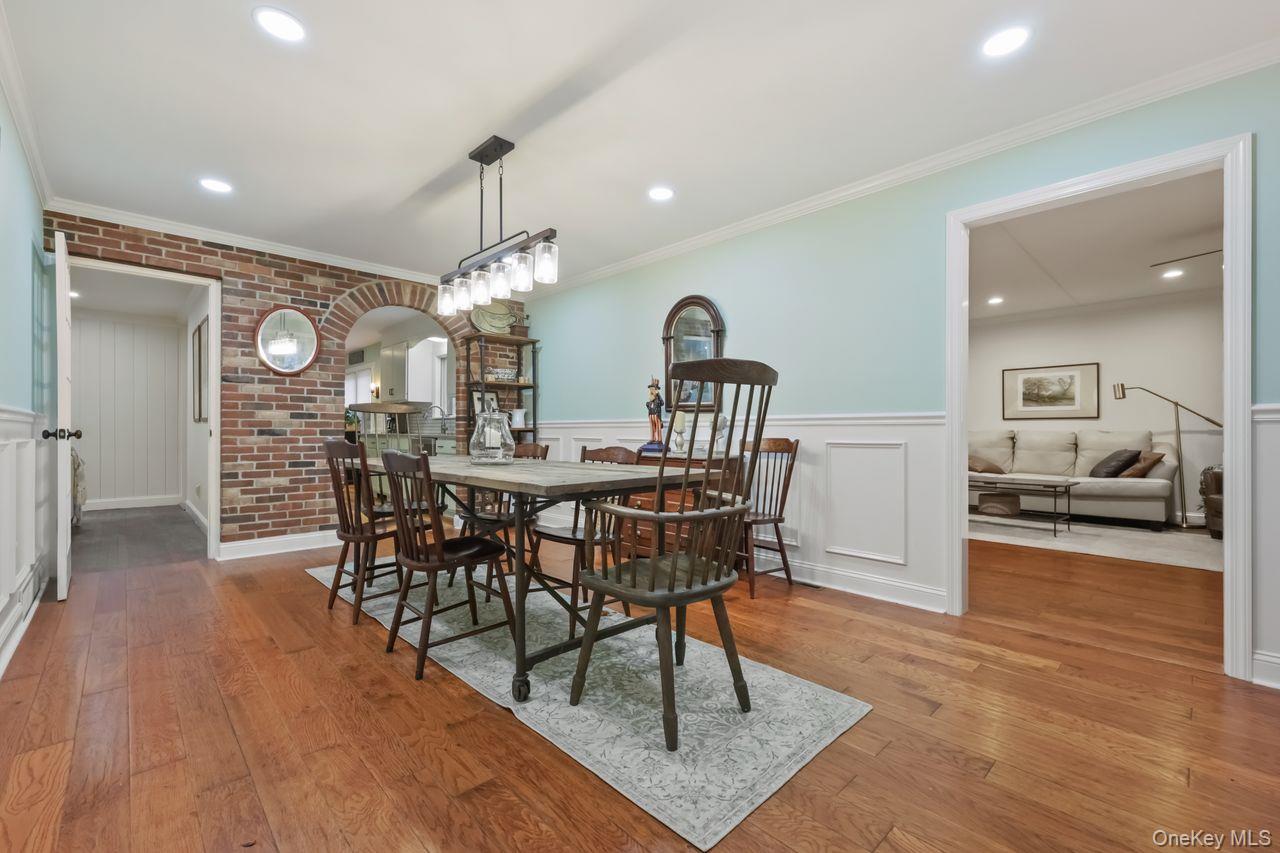 51 Knox Road Brewster, NY 10509 - Photo 11 of 31 a view of a dining room with furniture and wooden floor