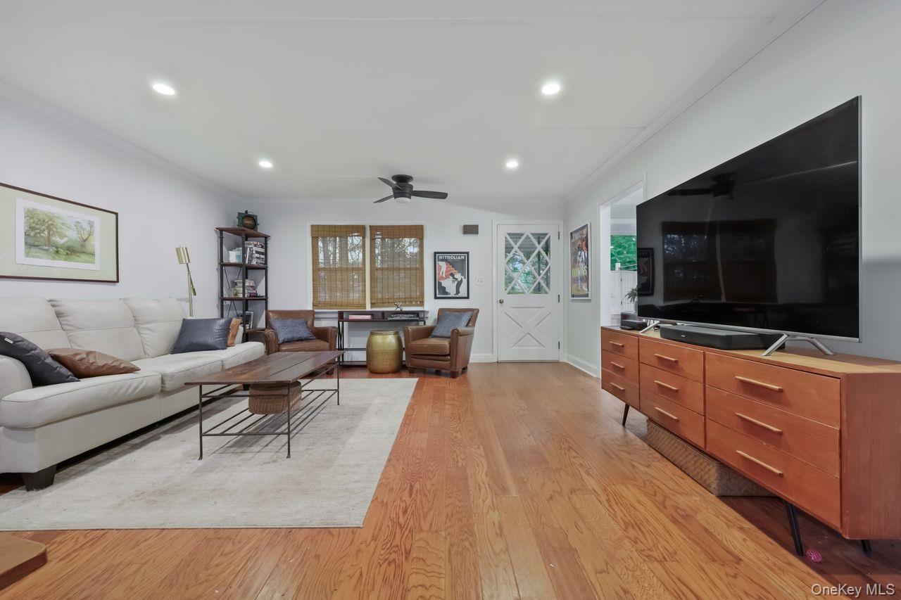 51 Knox Road Brewster, NY 10509 - Photo 12 of 31 a living room with furniture and a flat screen tv