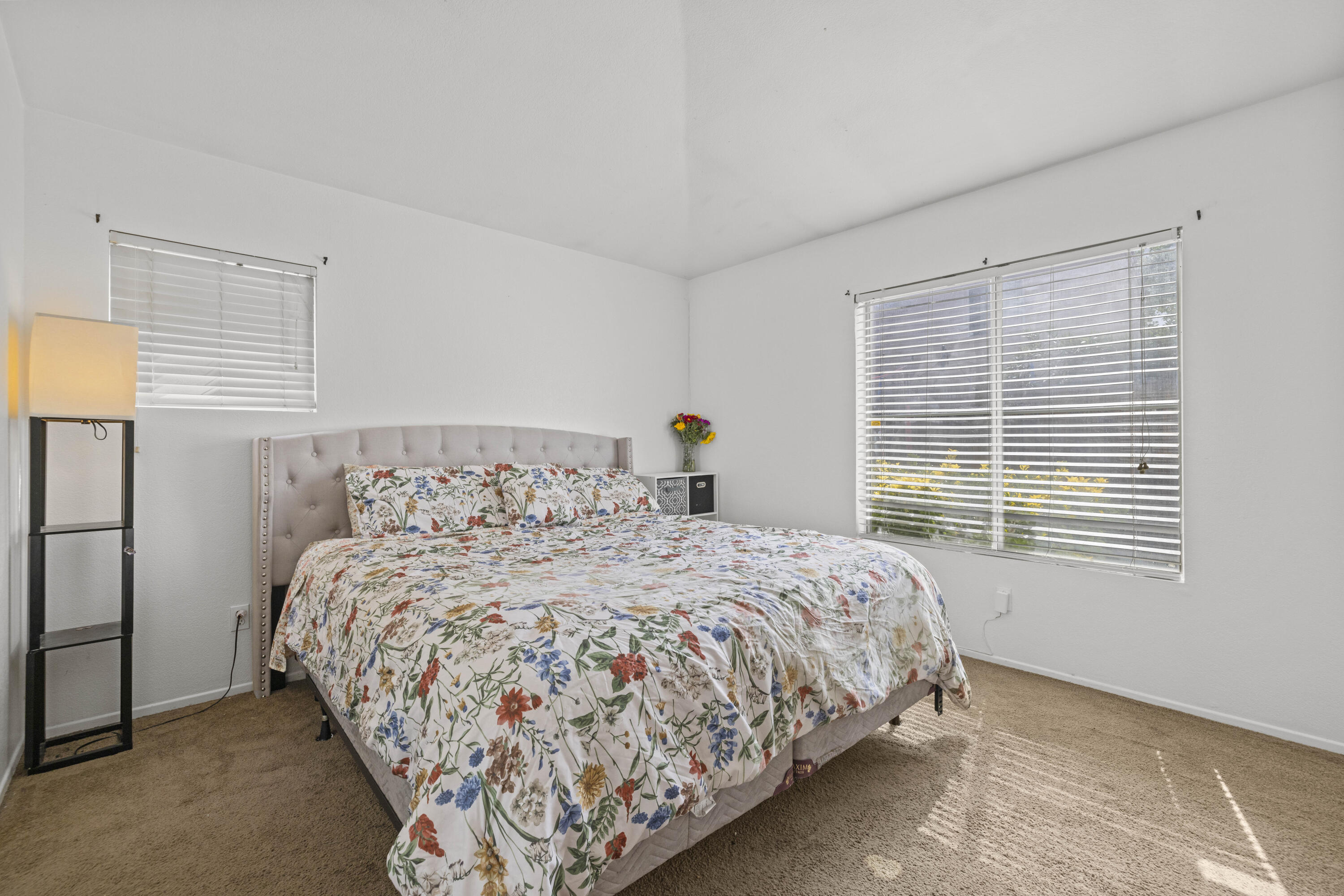 40131 La Cota Drive Palmdale, CA 93550 - Photo 12 of 26 a bedroom with a bed and a window