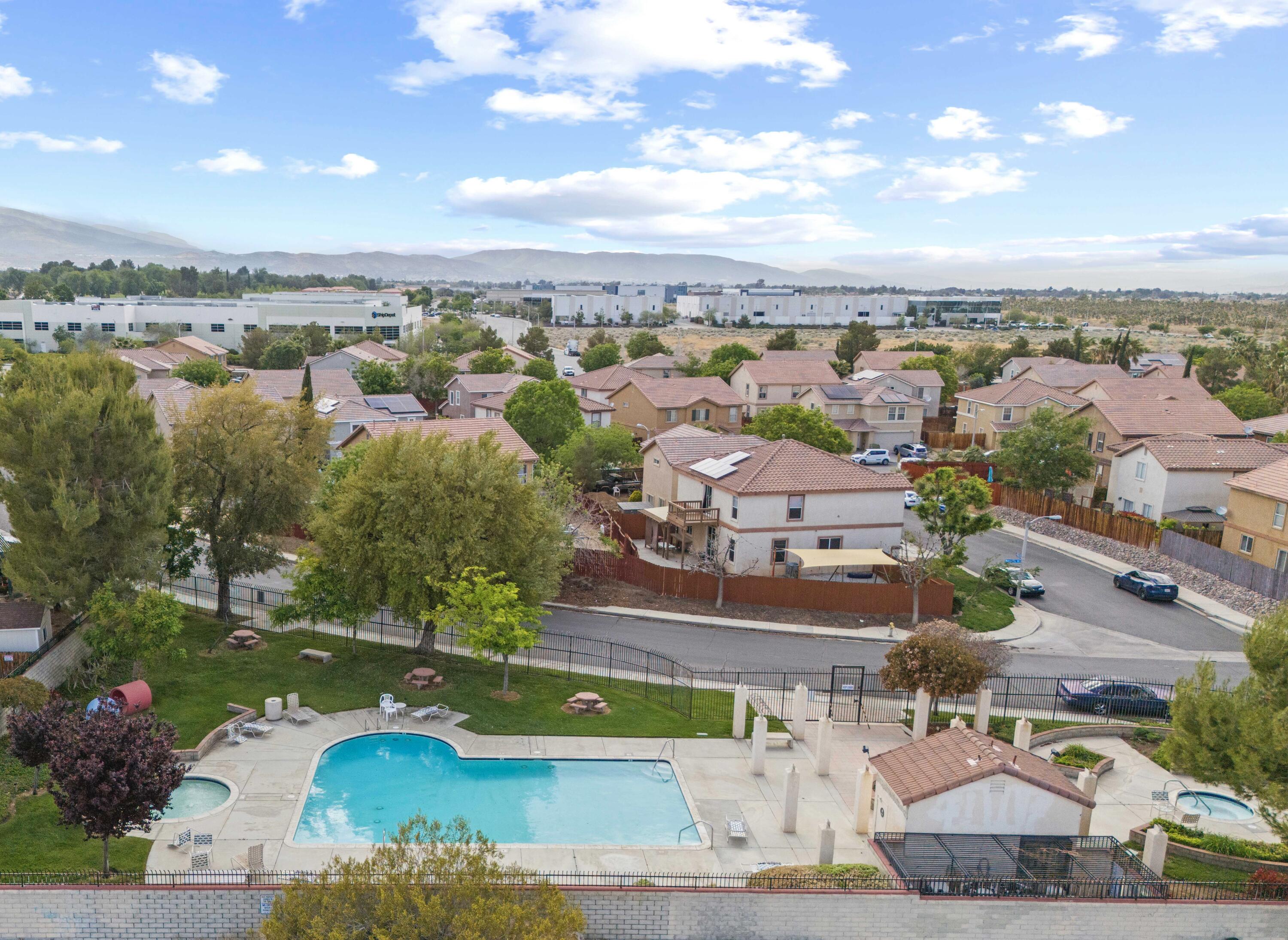 40131 La Cota Drive Palmdale, CA 93550 - Photo 24 of 26 an aerial view of residential houses with outdoor space and river