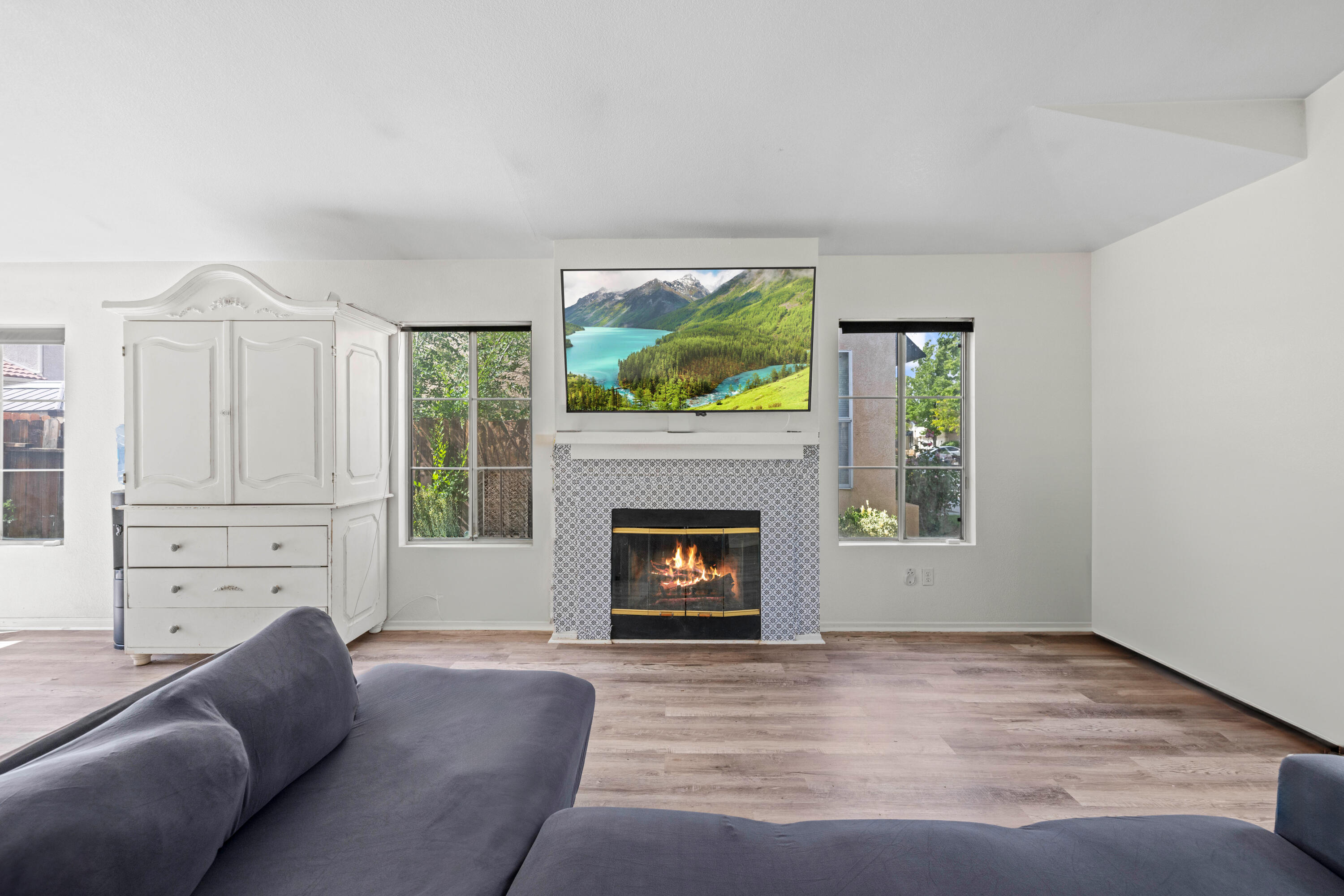 40131 La Cota Drive Palmdale, CA 93550 - Photo 5 of 26 a living room with furniture and a fireplace