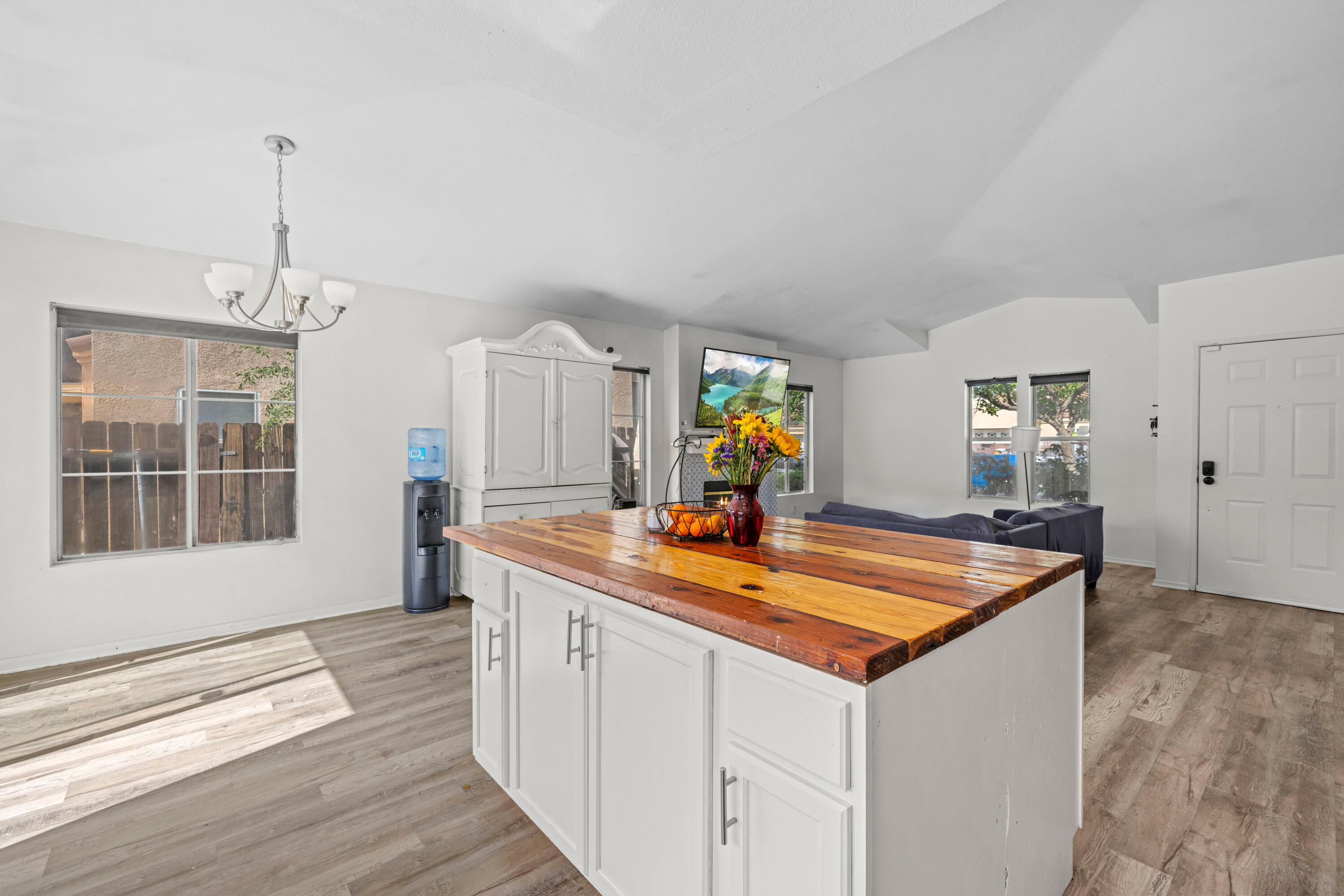 40131 La Cota Drive Palmdale, CA 93550 - Photo 6 of 26 a kitchen with stainless steel appliances granite countertop a sink and dishwasher with wooden floor
