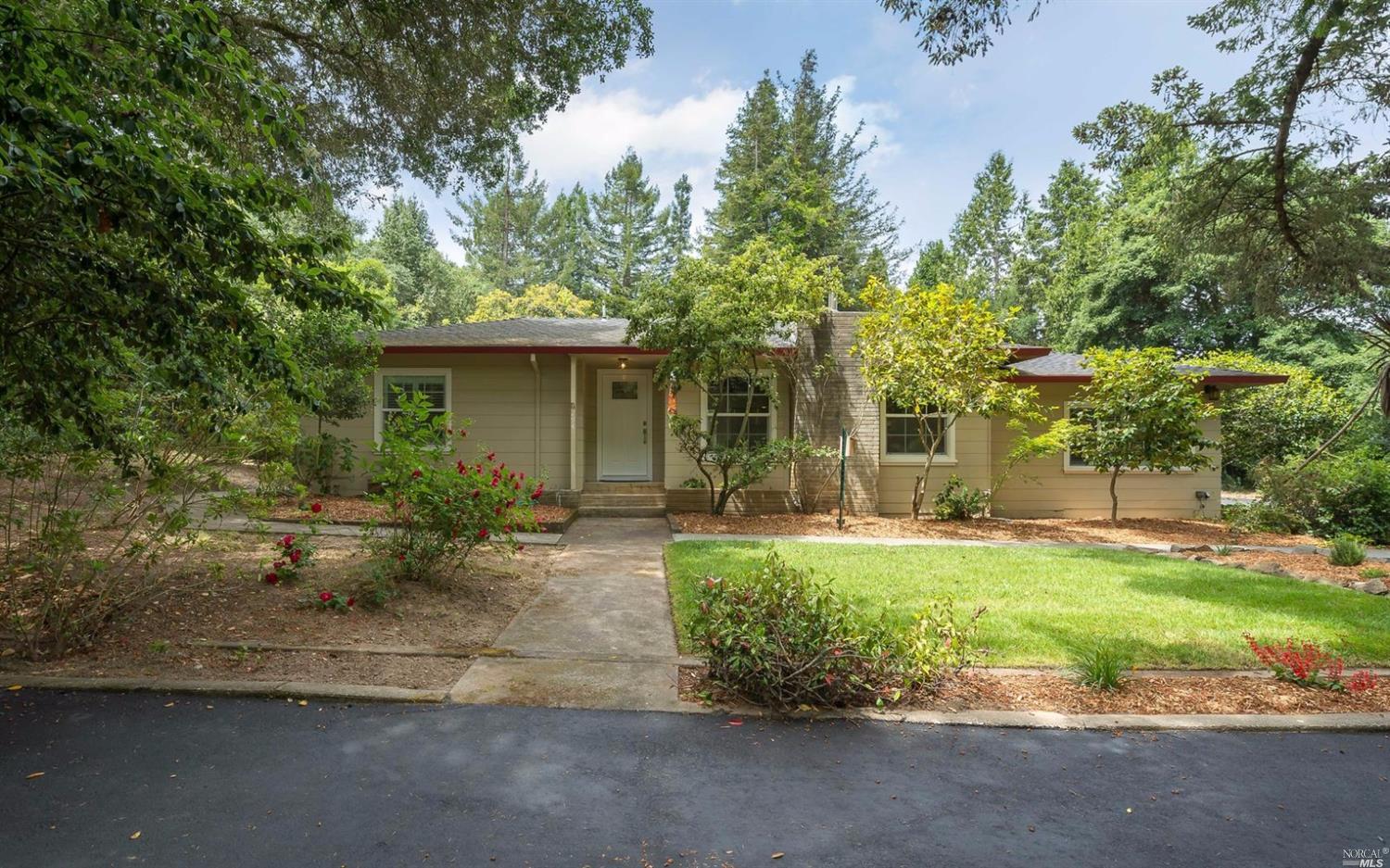 294 Bloomfield Road Sebastopol, CA 95472 - Photo 1 of 1 a front view of a house with a yard and porch