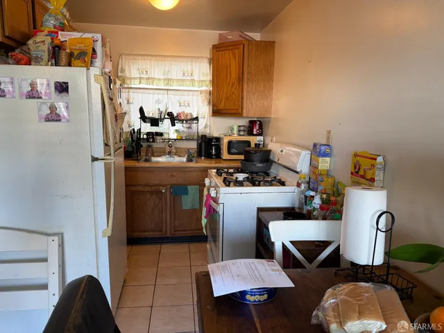 a bathroom with a sink a mirror and a shower