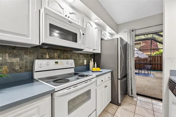 a kitchen with sink and window