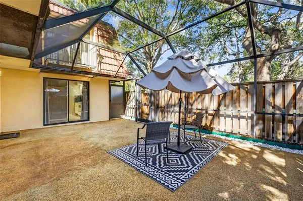 a view of entryway with a small yard