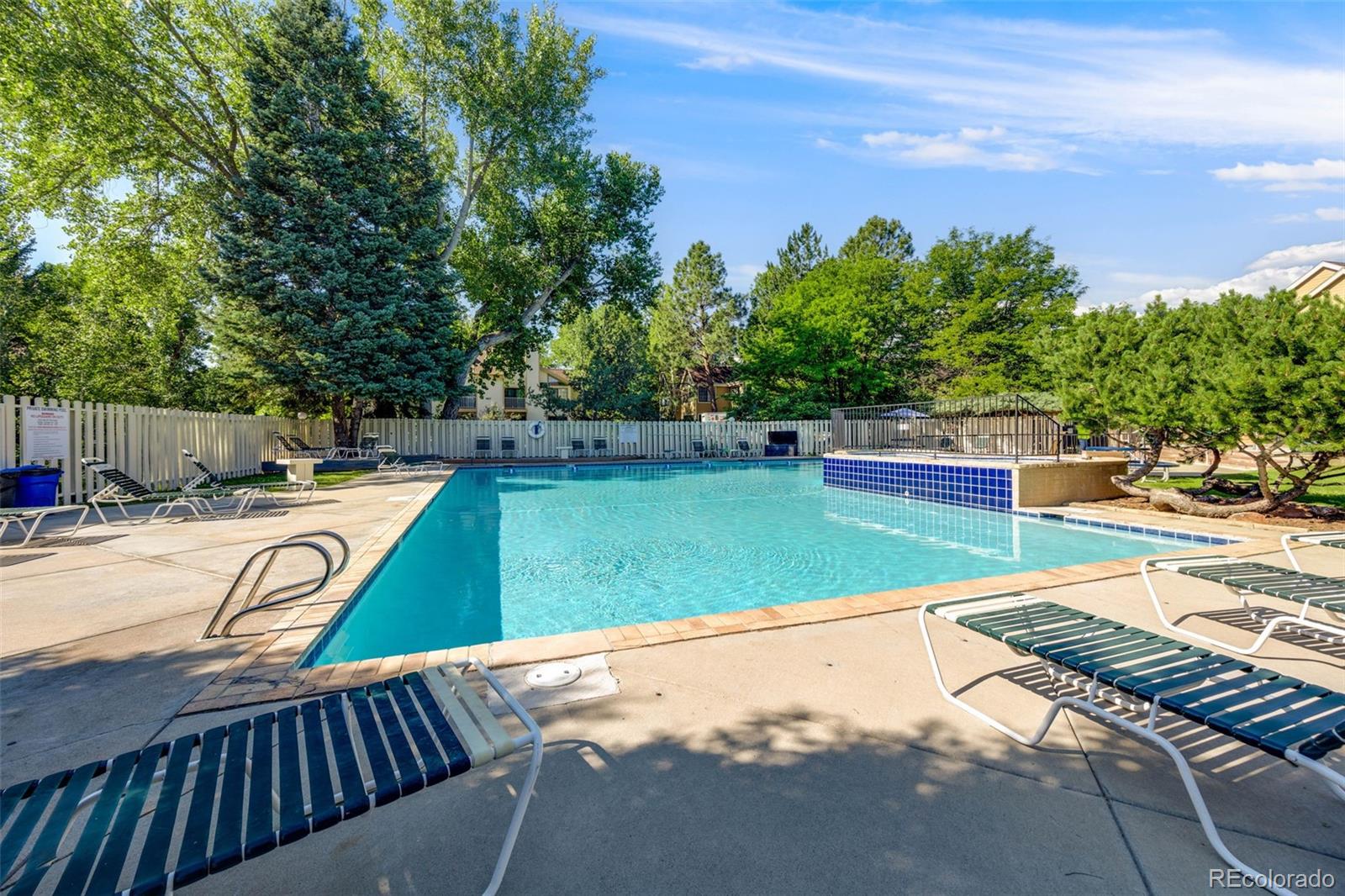 4811 White Rock Circle, Unit C Boulder, CO 80301 - Photo 14 of 19 a view of a swimming pool with a patio