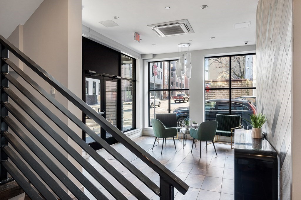 100 A Street, Unit 6 Boston, MA 02127 - Photo 33 of 37 a living room with furniture