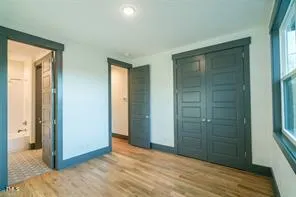 a view of entryway with wooden floor
