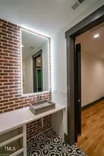 a view of a door and a window