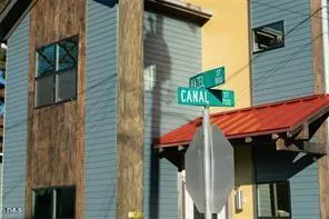 a red brick building with glass windows