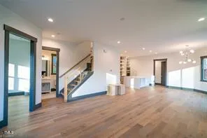 a view of a hallway with staircase