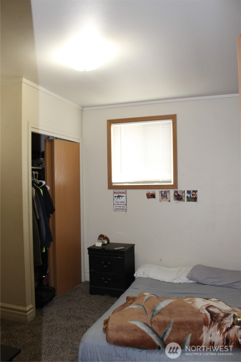 5788 Rd K Northeast Moses Lake, WA 98837 - Photo 34 of 40 a room with a bed and a window