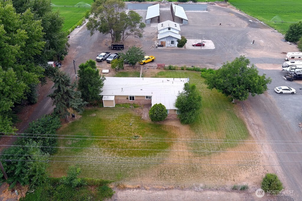 5788 Rd K Northeast Moses Lake, WA 98837 - Photo 4 of 40 an aerial view of residential houses with outdoor space and swimming pool