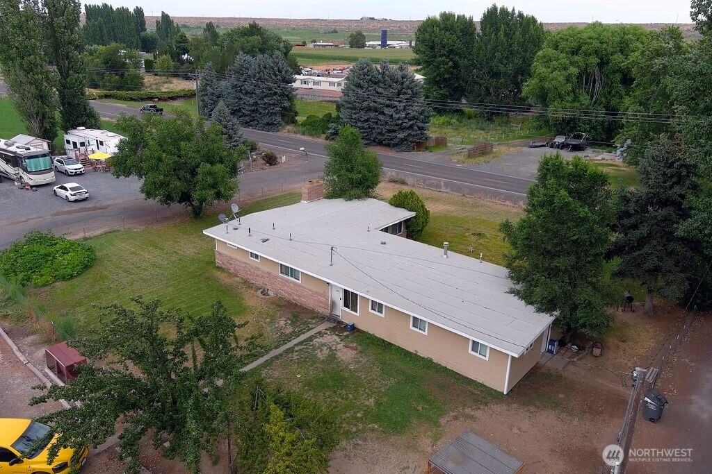 5788 Rd K Northeast Moses Lake, WA 98837 - Photo 6 of 40 an aerial view of a house having yard and a patio